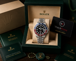 GMT-Master II red and blue Cerachrom bezel black dial and a Jubilee bracelet.